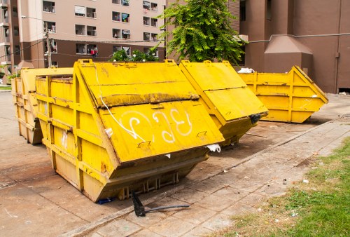 Workers segregating waste during office clearance