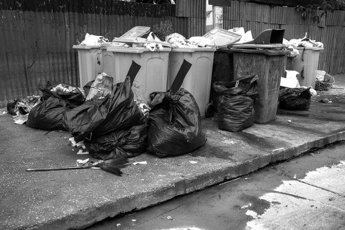 People arranging furniture for disposal in Carshalton