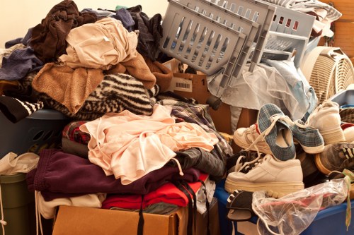 Professional team conducting flat clearance
